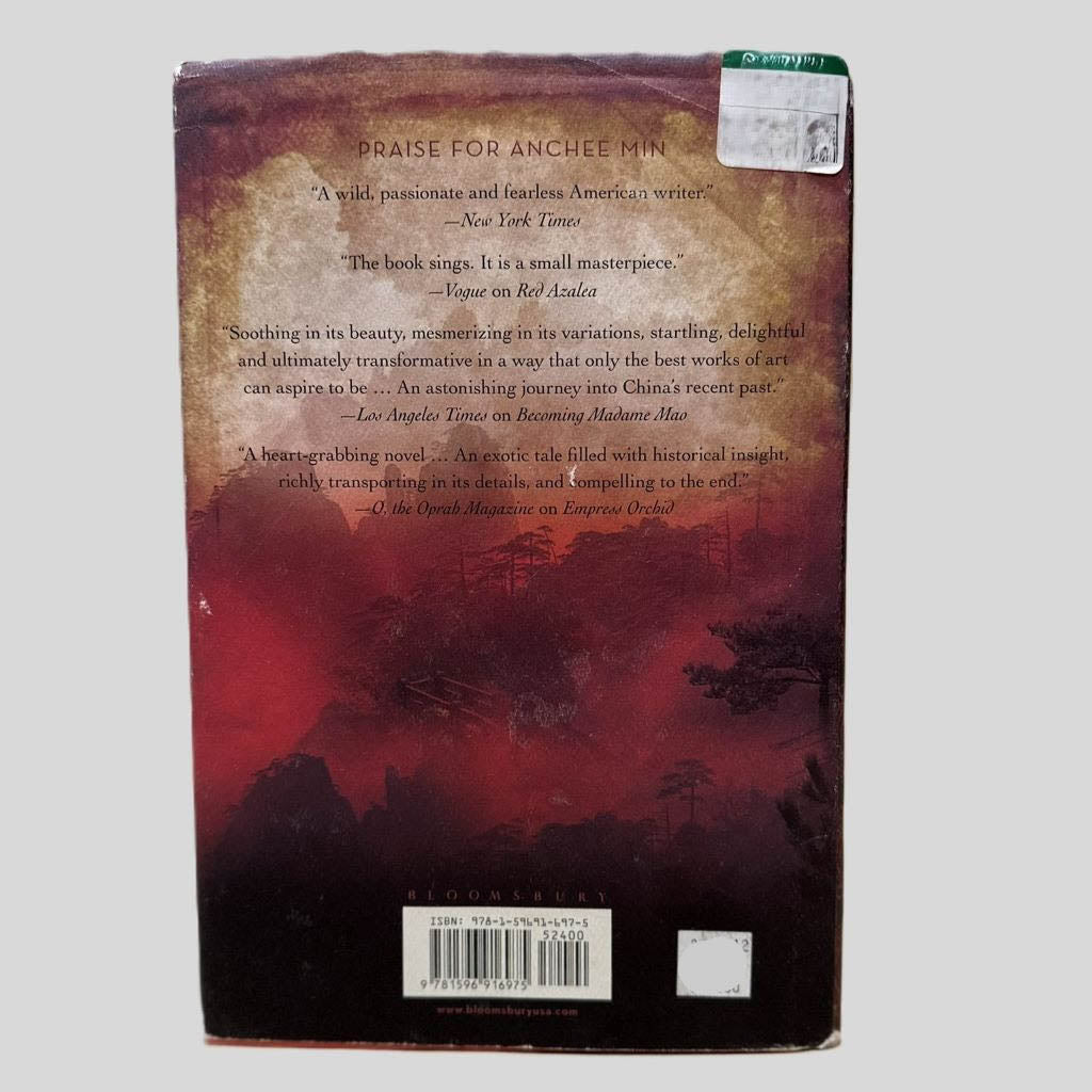 Back cover view of The Pearl of China by Anchee Min centered on a neutral light gray background. Dust jacket is present with visible wear around the edges. Sticker in the top right corner and lower right corner.