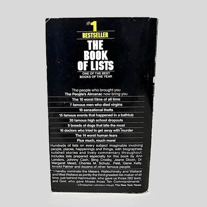 Back cover view of The People's Almanac Presents The Book of Lists centered on a neutral light gray background. Chipping present around the edges.