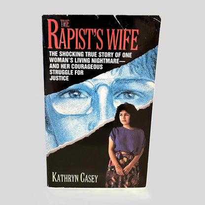 Front cover view of The Rapist's Wife by Kathryn Casey centered on a neutral light gray background. 