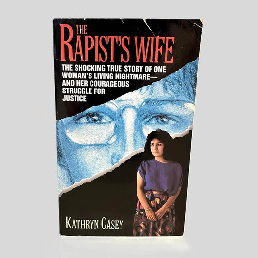 Front cover view of The Rapist's Wife by Kathryn Casey centered on a neutral light gray background. 