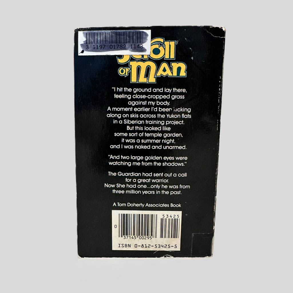 Back cover view of The Scroll of Man by John Dalmas centered on a neutral light gray background. Creasing and chipping along the edges. Library barcode sticker in the top left corner, colored over with black ink.