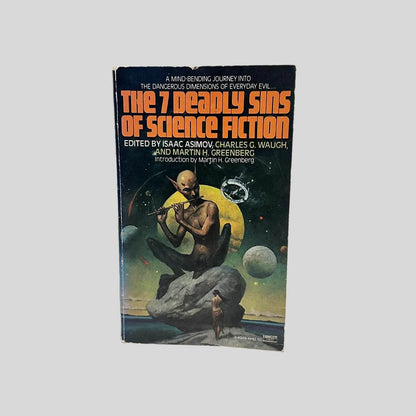 Front cover view of The Seven Deadly Sins of Science Fiction Edited By Isaac Asimov centered on a neutral light gray background. Creasing and chipping are present from age. Cover art is vibrant.