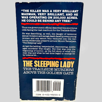 Back cover view of The Sleeping Lady by Robert Graysmith centered on a neutral light gray background. Back cover shows chipping.