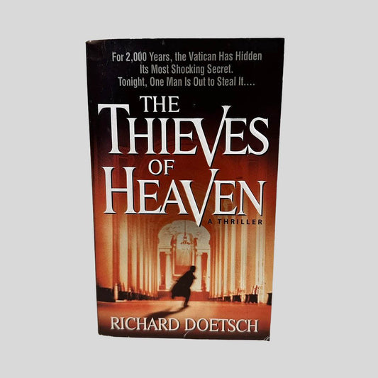 Front cover view of The Thieves of Heaven by Richard Doetsch centered on a neutral light gray background. 
