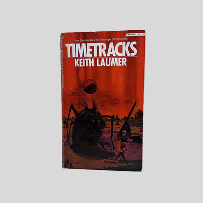 Front cover view of Timetracks by Keith Laumer centered on a neutral light gray background. Chipping around edges.