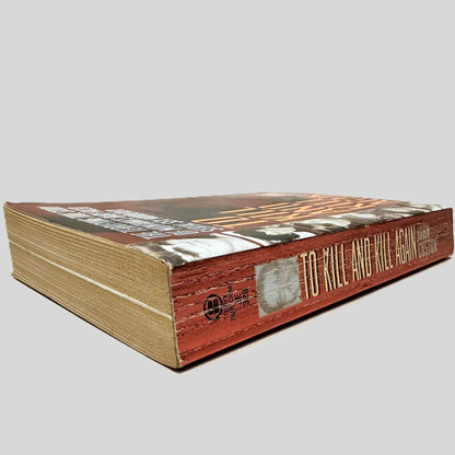 Close-up spine view of To Kill and Kill Again by John Coston centered on a neutral light gray background. Spine shows creasing.