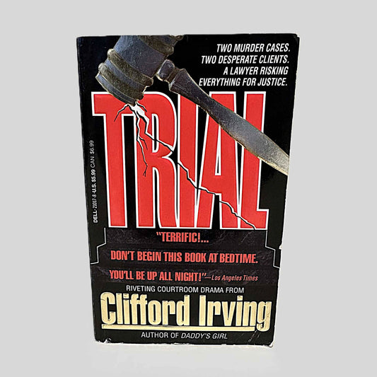 Front cover view of Trial by Clifford Irving centered on a neutral light gray background. Cover shows chipping in the corners. 