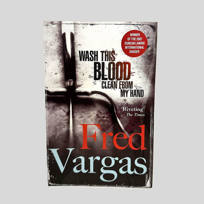Front cover view of Wash This Blood Clean from My Hand Fred Vargas centered on a neutral light gray background. 