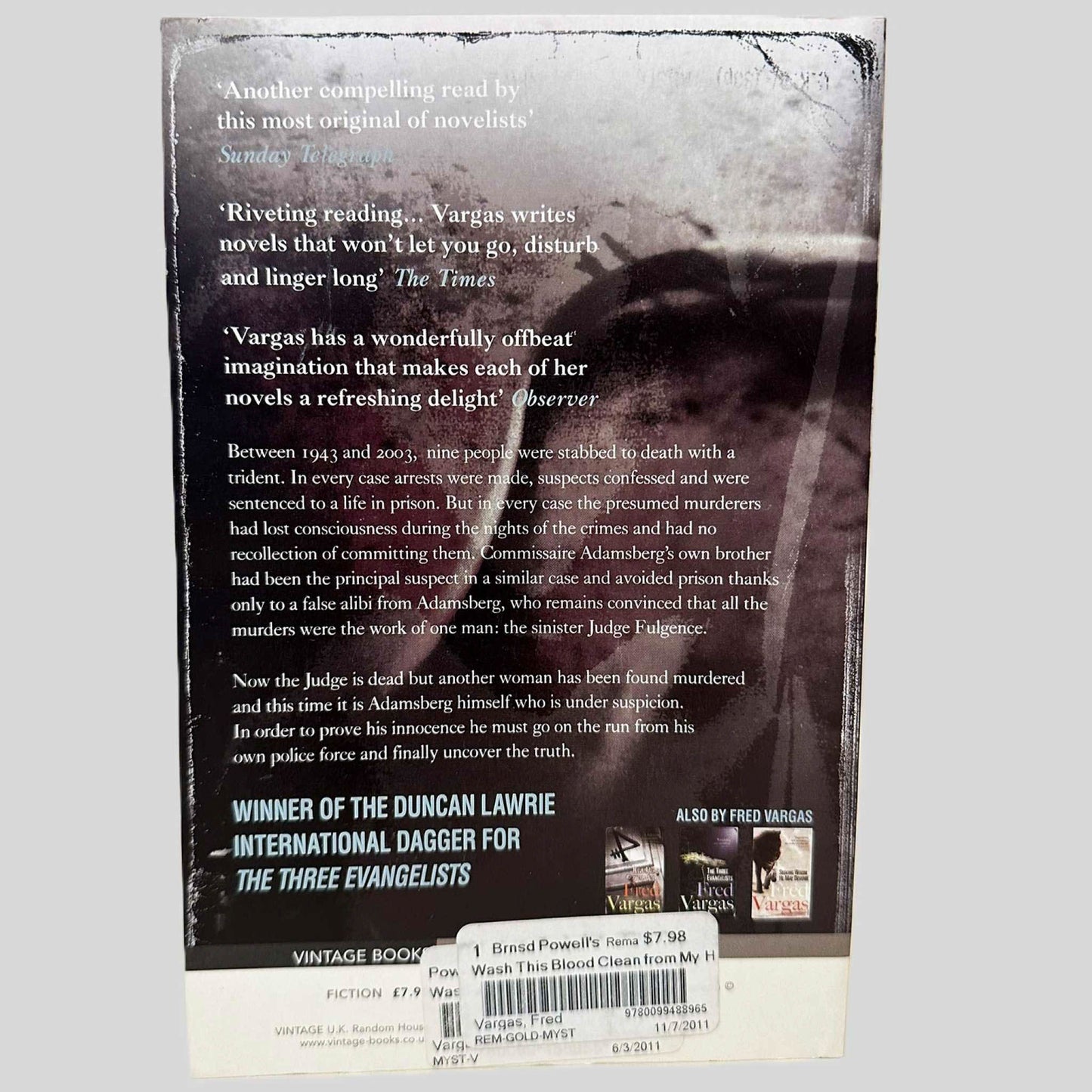 Back cover view of Wash This Blood Clean from My Hand Fred Vargas centered on a neutral light gray background. 