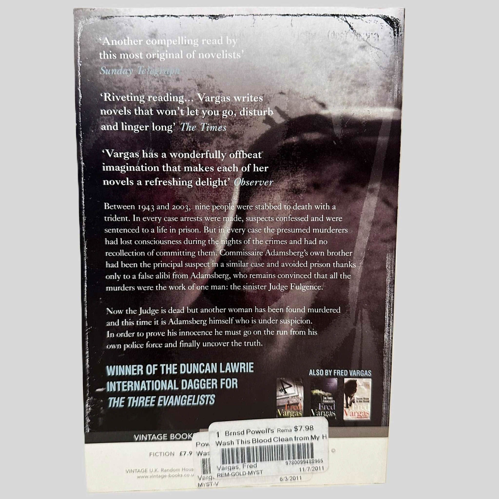 Back cover view of Wash This Blood Clean from My Hand Fred Vargas centered on a neutral light gray background. 