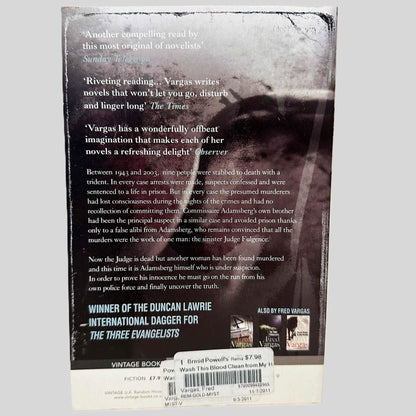 Back cover view of Wash This Blood Clean from My Hand Fred Vargas centered on a neutral light gray background. 