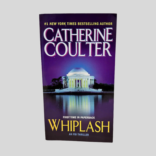 Front cover view of Whiplash by Catherine Coulter centered on a neutral light gray background. 