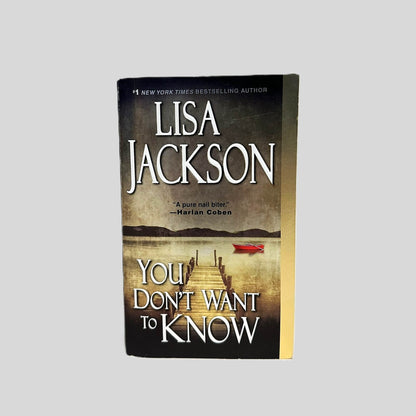 Front cover view of You Don't Want To Know by Lisa Jackson centered on a neutral light gray background. 