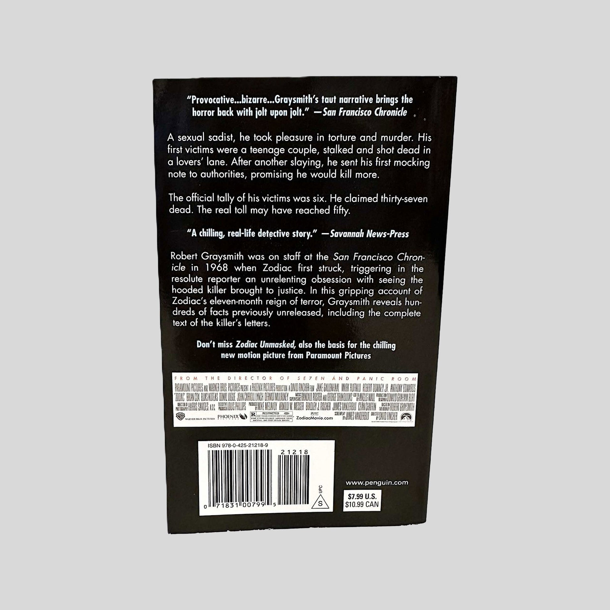 Back cover view of Zodiac by Robert Graysmith centered on a neutral light gray background. 