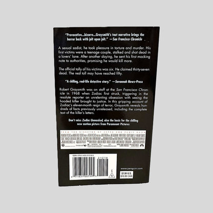 Back cover view of Zodiac by Robert Graysmith centered on a neutral light gray background. 
