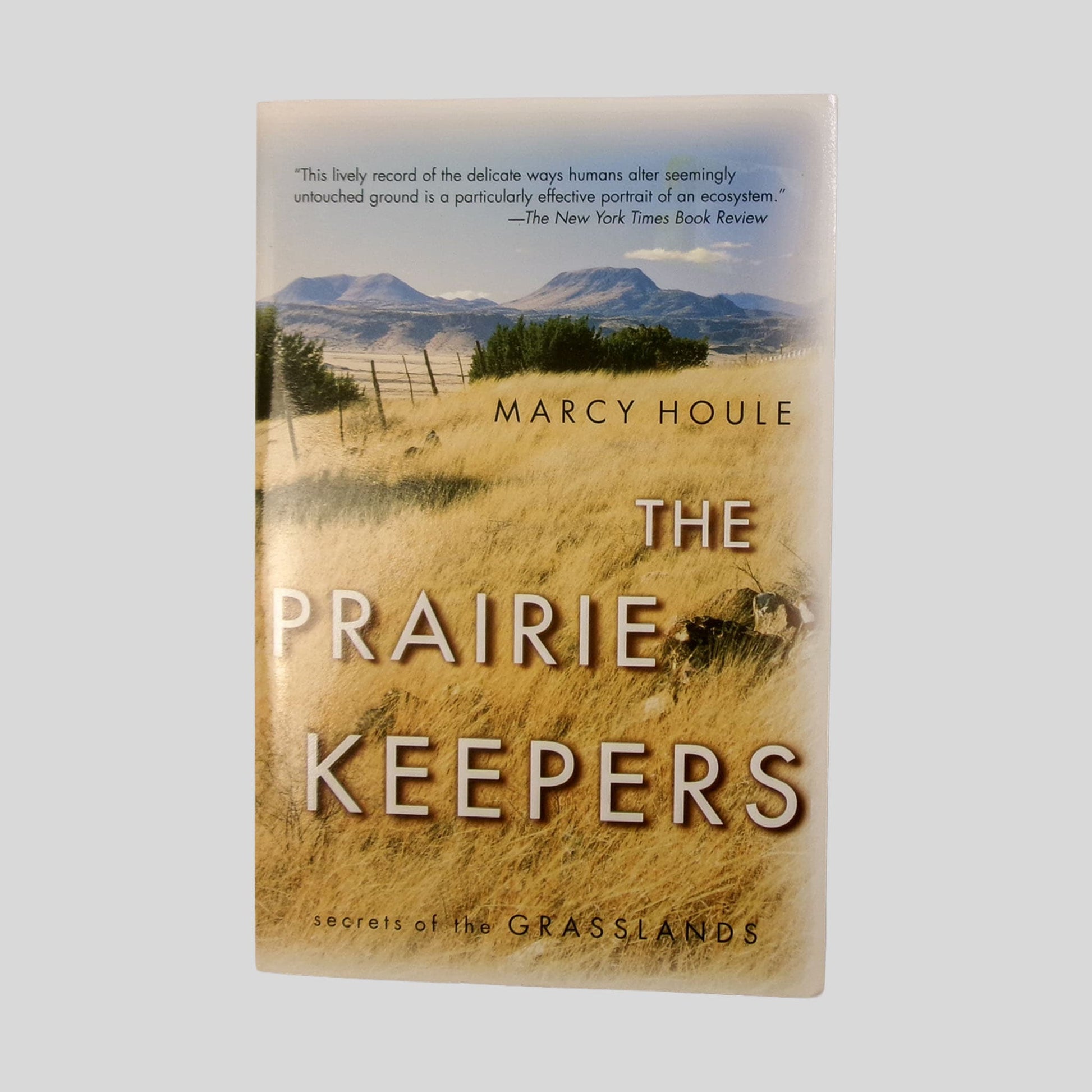 Uncover the "secrets of the grasslands" with the front cover of "The Prairie Keepers," featuring a scenic photograph of the vast Oregon prairie under a soft sky. The screen showcases a prominent endorsement from The New York Times Book Review calling it an "effective portrait of an ecosystem". This Fehmerling Books paperback is a perfect addition for those interested in environmental conservation and the human-nature relationship.