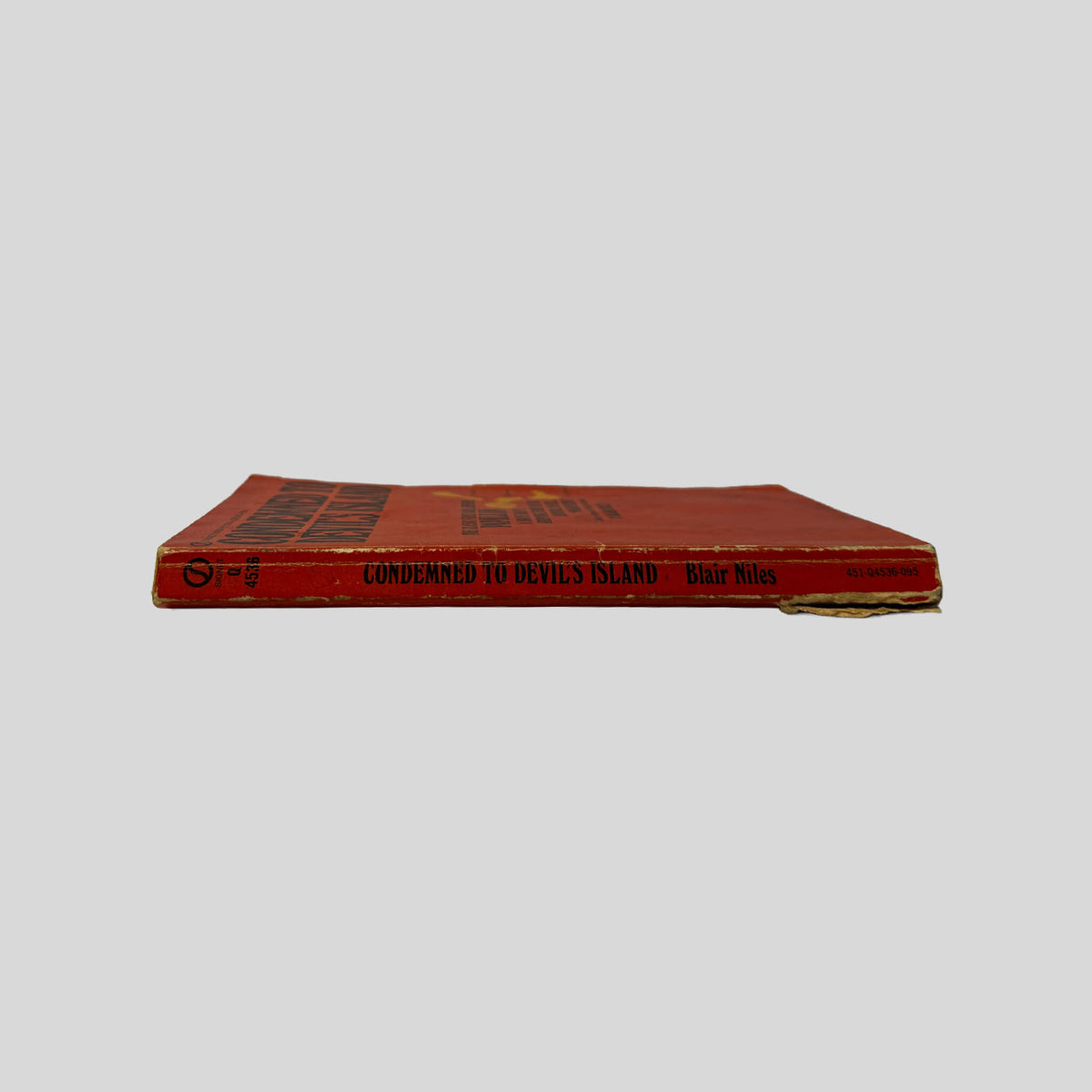 Spine view of Condemned To Devil's Island vintage Signet mass market paperback edition by Blair Niles.