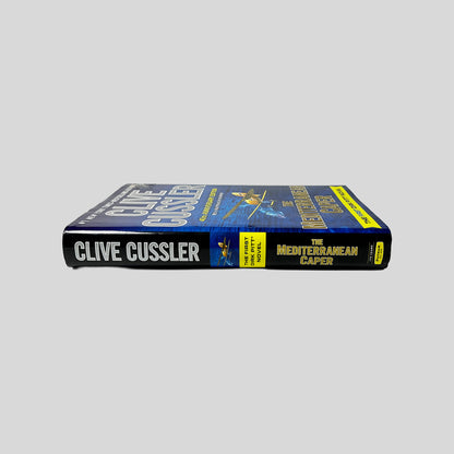 Spine view of The Mediterranean Caper hardcover edition by Clive Cussler.