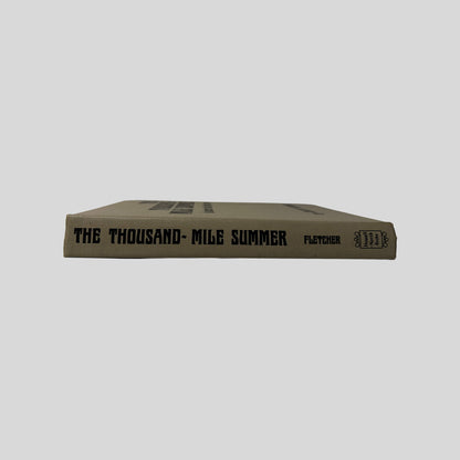 Spine view of The Thousand-Mile Summer vintage hardcover edition by Colin Fletcher.