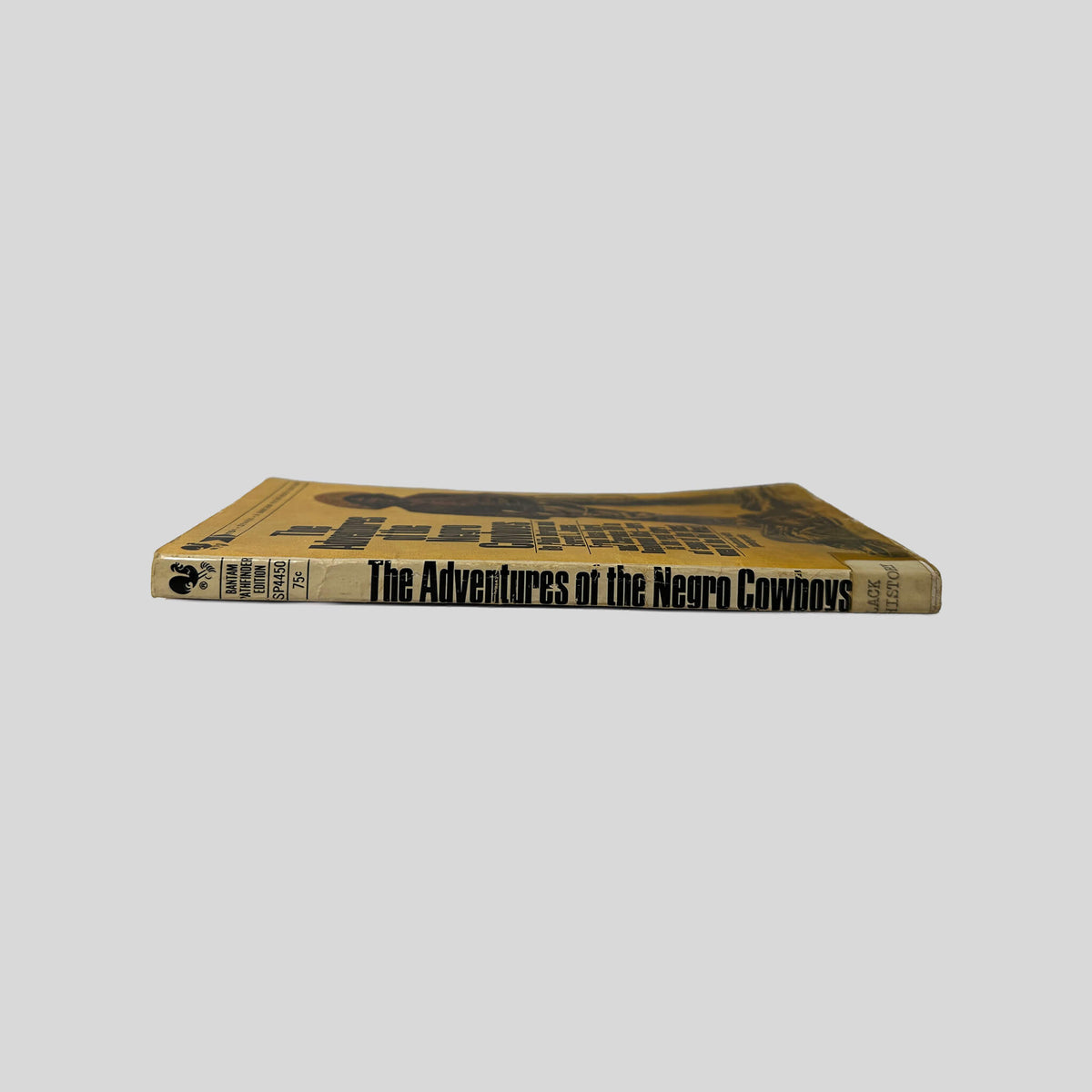 Spine view of The Adventures Of The Negro Cowboys vintage Bantam paperback edition by Philip Durham and Everett L. Jones.