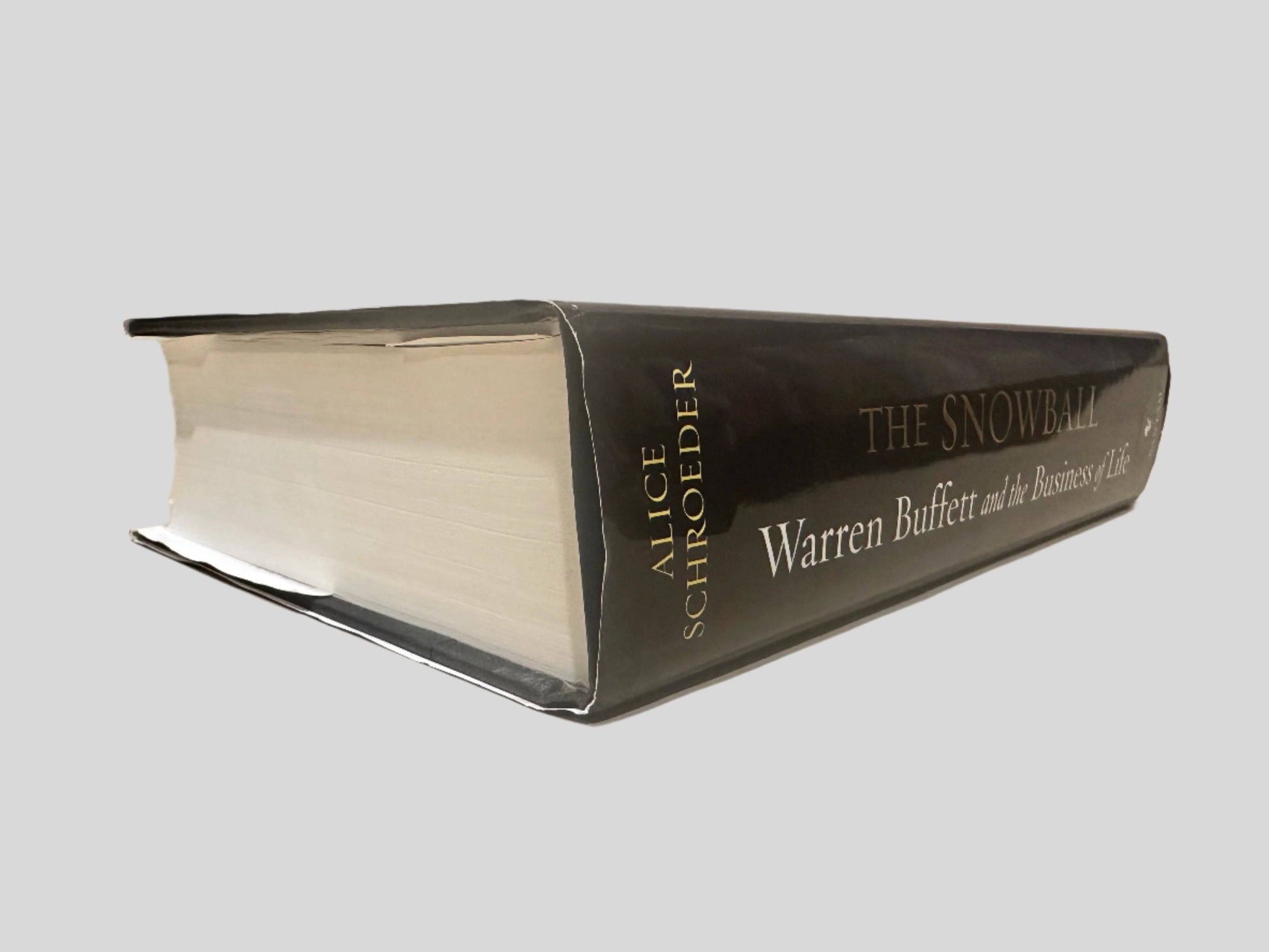 The Snowball: Warren Buffett and the Business of Life by Alice Schroeder - Book Spine