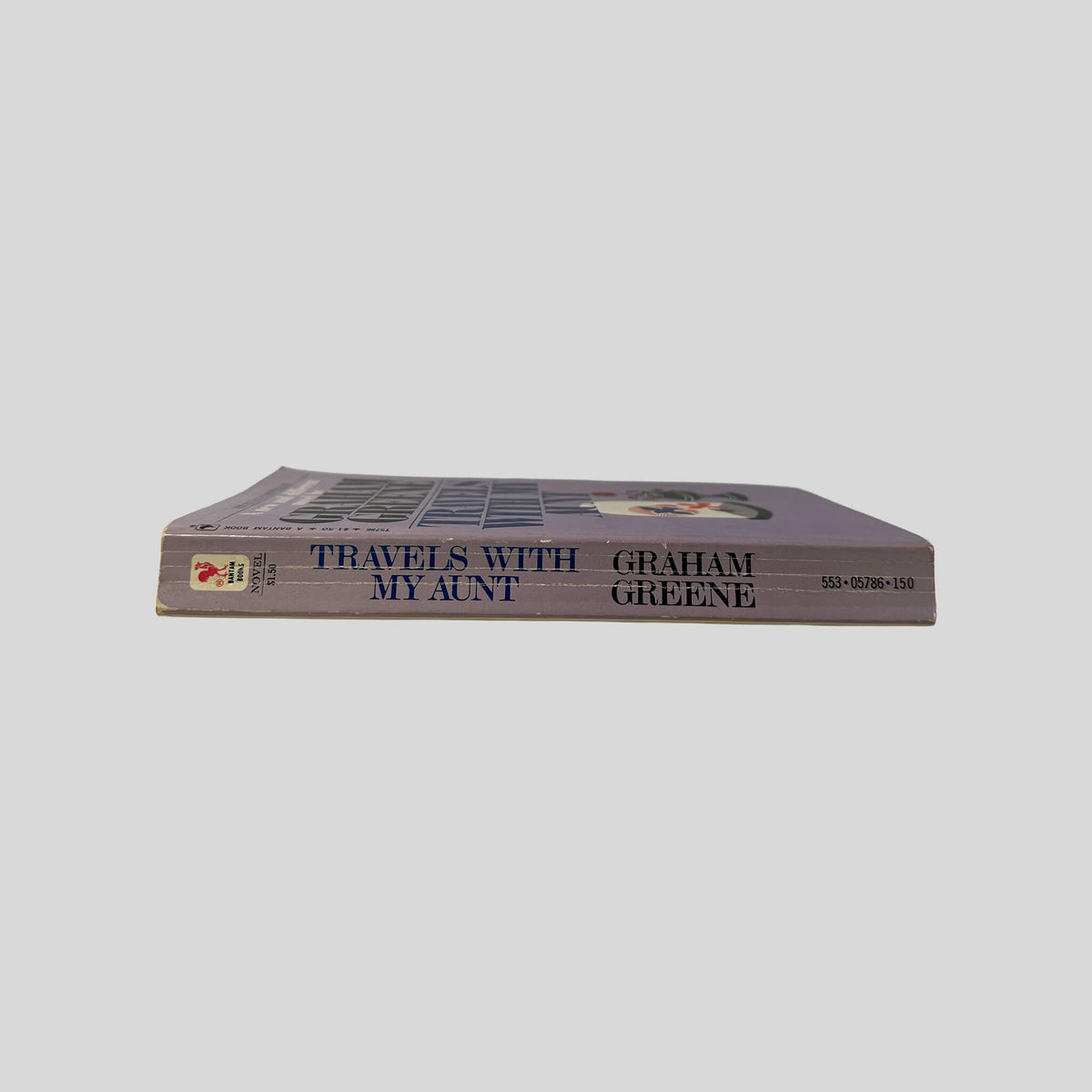 Spine view of Travels With My Aunt vintage Bantam mass market paperback edition by Graham Greene.