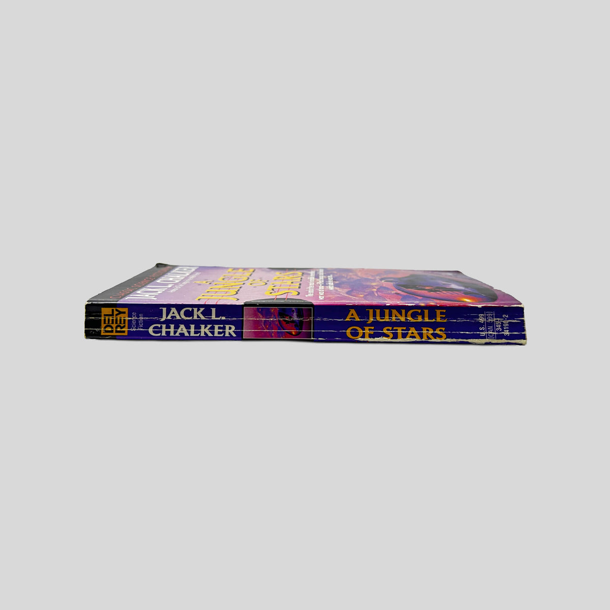 Spine view of A Jungle of Stars vintage paperback edition by Jack L. Chalker.