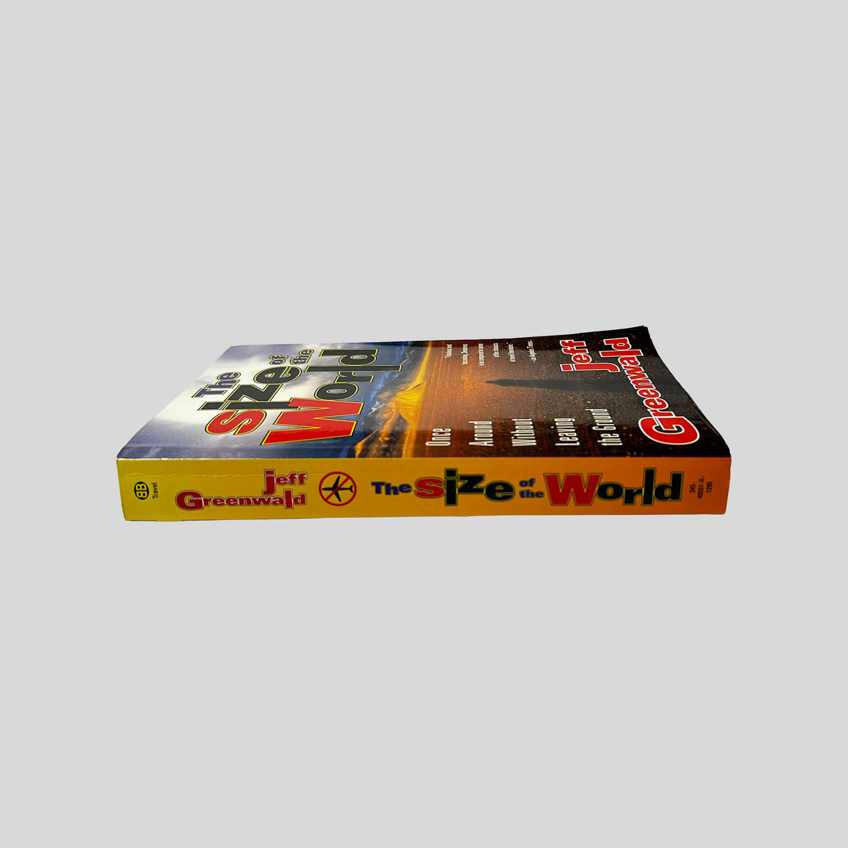 Spine view of The Size of the World vintage paperback edition by Jeff Greenwald.