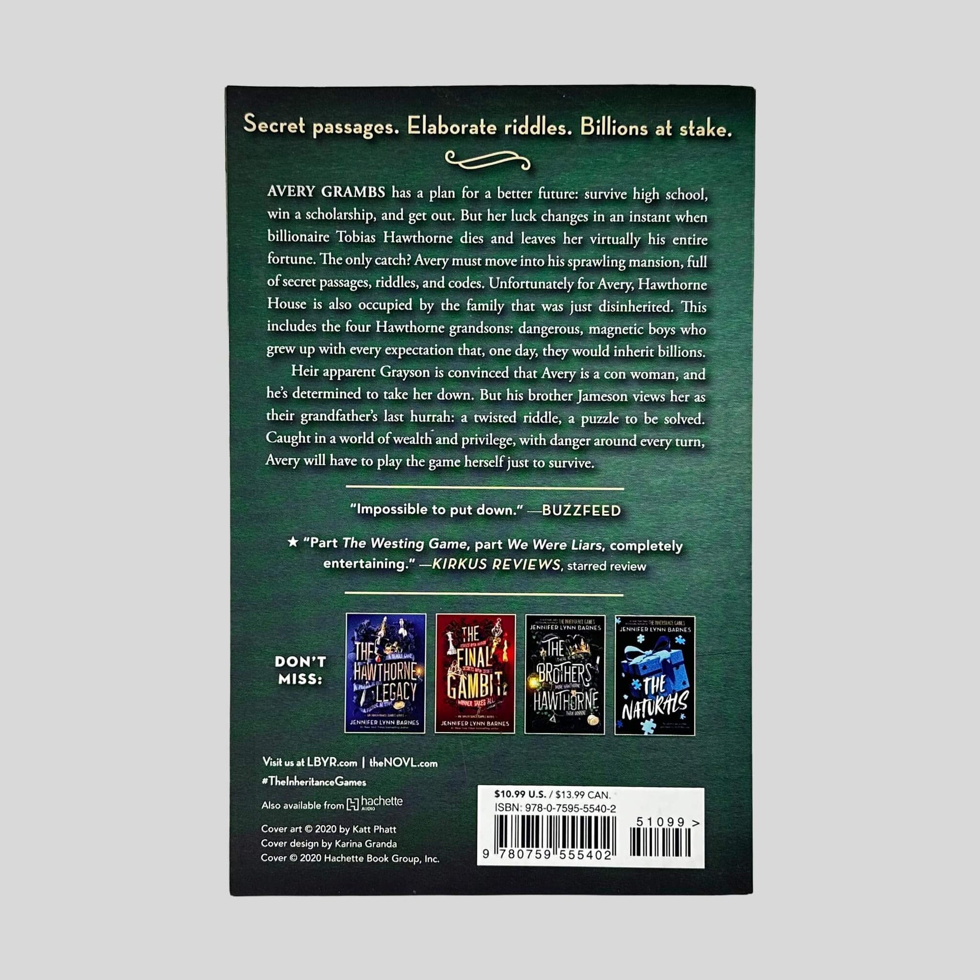 Back cover of The Inheritance Games by Jennifer Lynn Barnes paperback showing plot summary, praise quotes, ISBN barcode, and clean Like New cover condition.