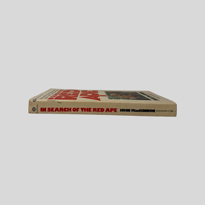 Spine view of In Search Of The Red Ape vintage mass market paperback edition by John MacKinnon.
