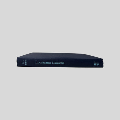 Spine view of Louisiana Lament vintage Forge hardcover edition by Julie Smith.
