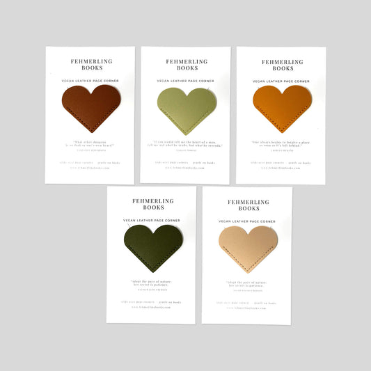 Vegan leather heart corner bookmark set in Earth and Botanicals palette arranged on neutral background by Fehmerling Books.