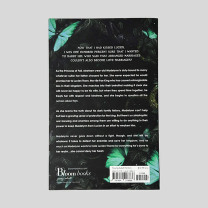 Back cover of The Ruthless Fae King paperback by Leia Stone showing plot summary for Madelynn and Lucien Thorne, Bloom Books logo, ISBN barcode, and clean Like New cover condition.