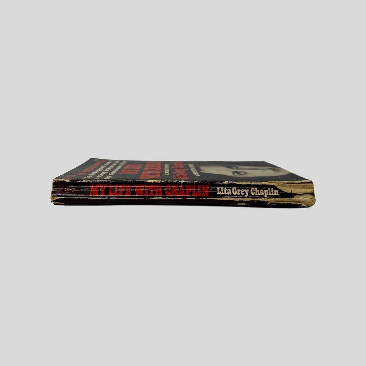 Spine view of My Life With Chaplin vintage Dell mass market paperback edition by Lita Grey Chaplin.