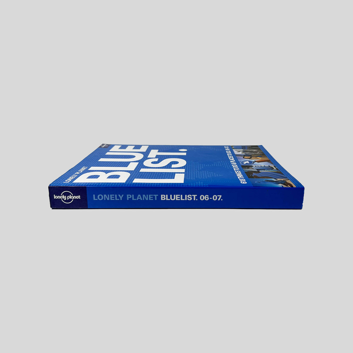 Spine view of The Lonely Planet Bluelist 2006 vintage paperback guide.