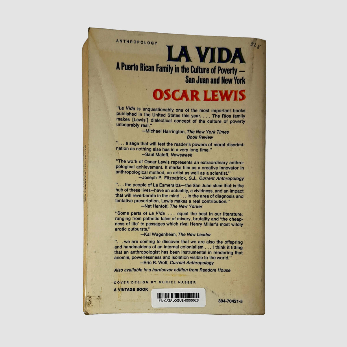 Back cover of La Vida by Oscar Lewis showing back text summary and critical reviews.