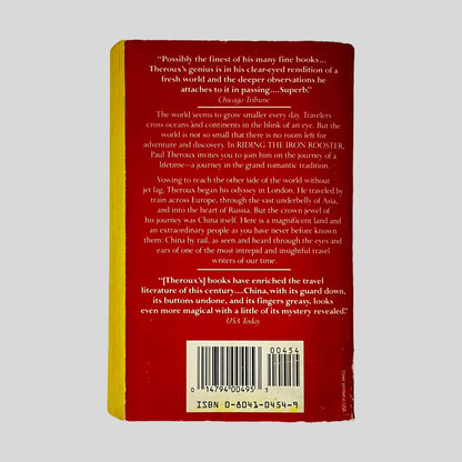 Back cover of Riding the Iron Rooster by Paul Theroux showing back cover summary and review quotes.
