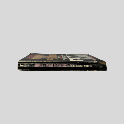 Spine view of Murder In The Penthouse vintage Tower Publications mass market paperback edition by Peter McCurtin.