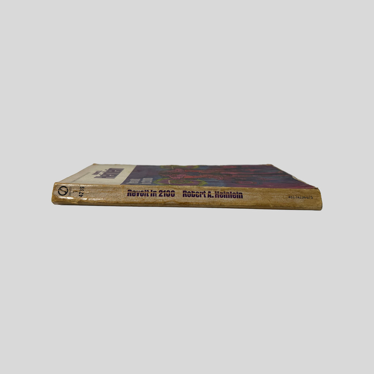 Spine view of Revolt In 2100 vintage mass market paperback edition by Robert A. Heinlein.