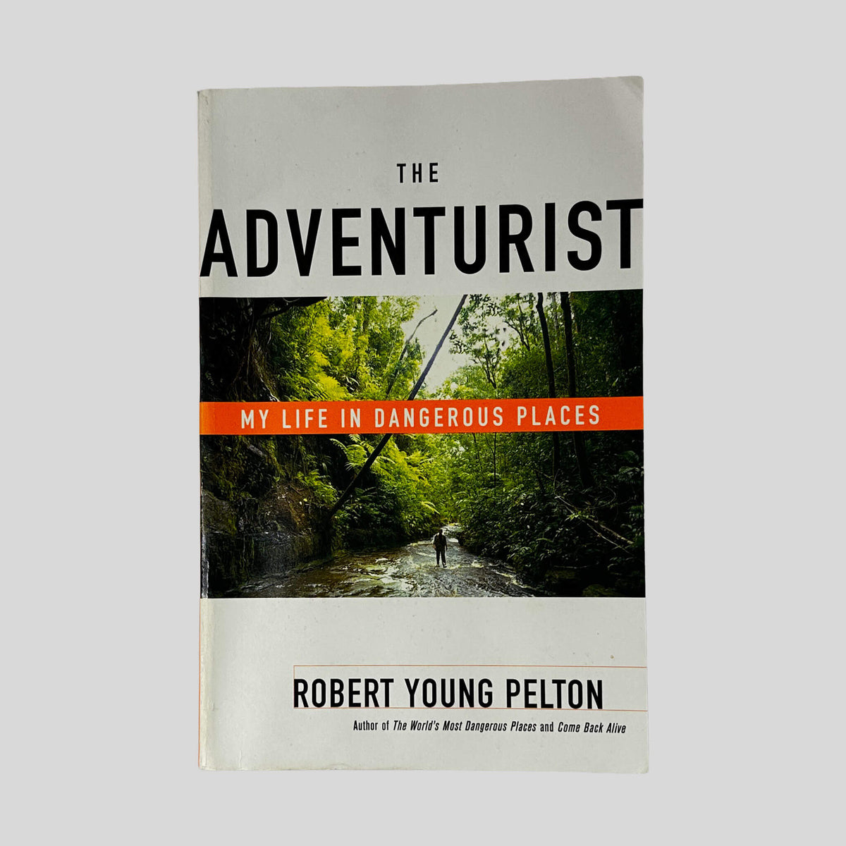 Front cover of The Adventurist by Robert Young Pelton, vintage acceptable condition paperback edition (Travel memoir & biography).