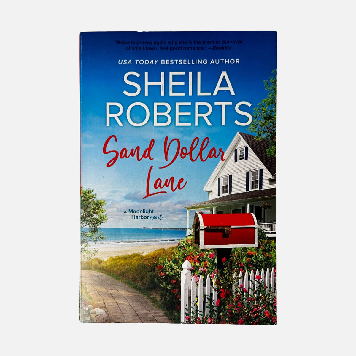 Front cover of Sand Dollar Lane by Sheila Roberts, used very good condition paperback edition (Contemporary romance novel).