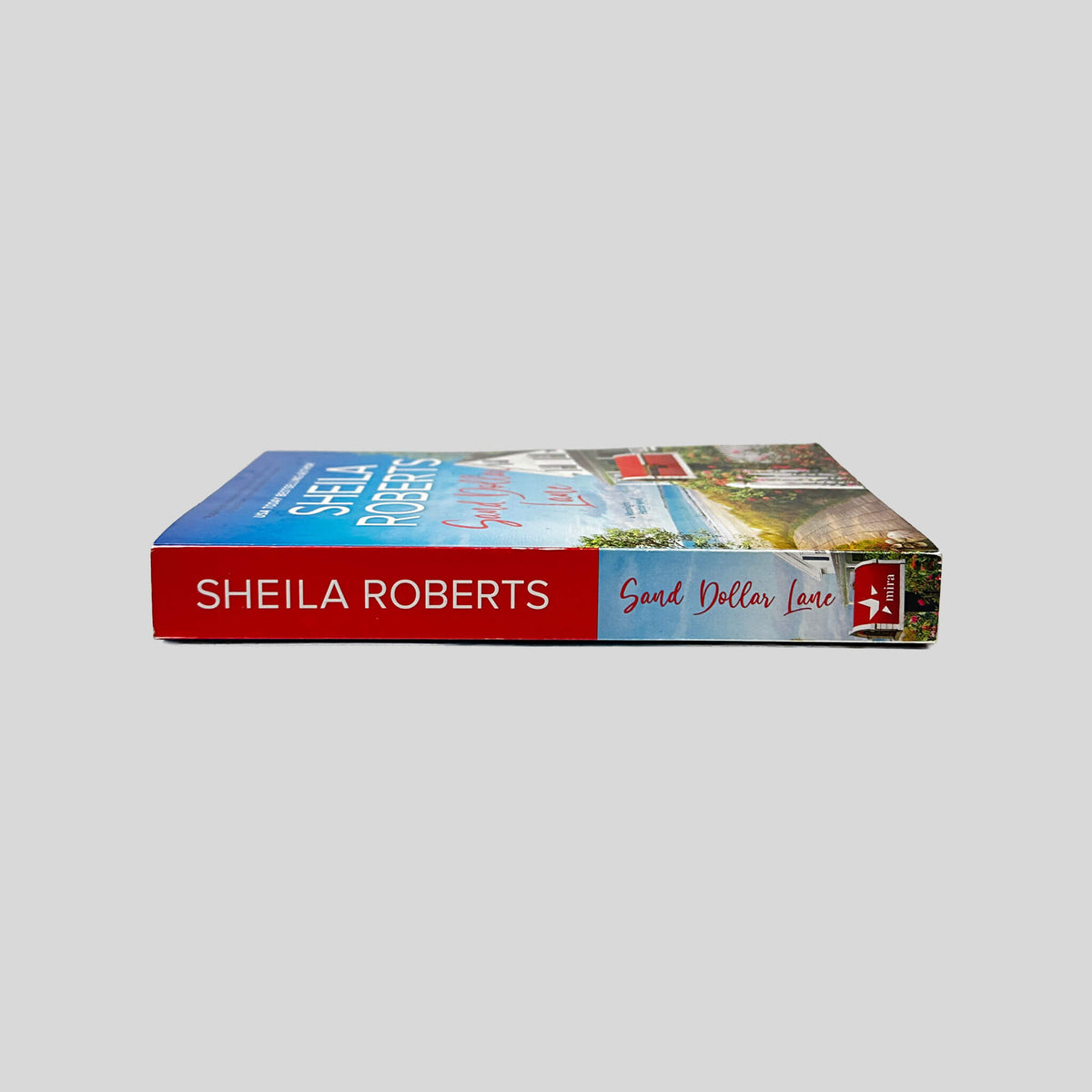 Spine view of Sand Dollar Lane paperback edition by Sheila Roberts.