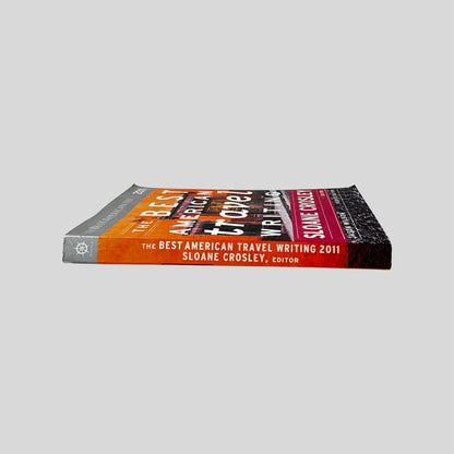 Spine view of The Best American Travel Writing 2011 paperback edition edited by Sloane Crosley.
