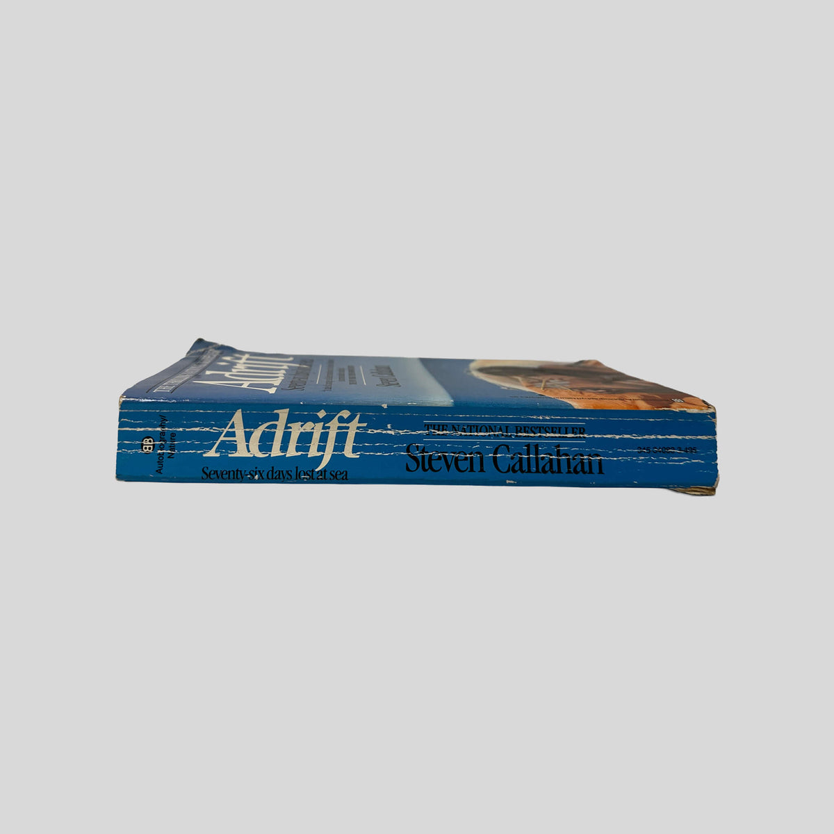 Spine view of Adrift Seventy-Six Days Lost At Sea vintage mass market paperback edition by Steven Callahan.