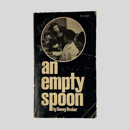 Front cover of An Empty Spoon by Sunny Decker, vintage 1973 Scholastic acceptable condition mass market paperback edition (Biography & teaching memoir).