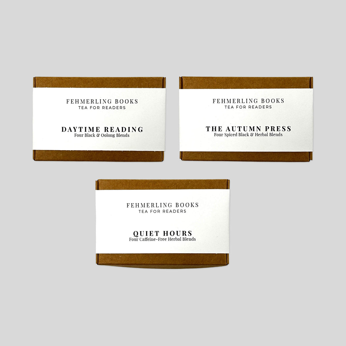 Three Fehmerling Books Tea for Readers kraft flight boxes with cream belly bands featuring The Autumn Press, Daytime Reading, and Quiet Hours.