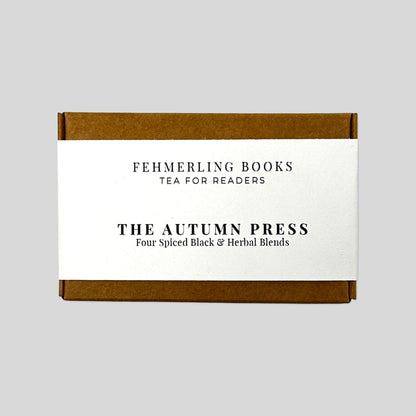 The Autumn Press tea flight box by Fehmerling Books featuring four spiced black and herbal loose-leaf blends.