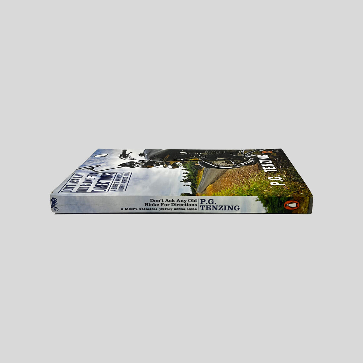 Spine view of Don't Ask Any Old Bloke for Directions paperback edition by P.G. Tenzing.