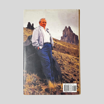 Back cover of The Fallen Man by Tony Hillerman showing back cover summary and author details.