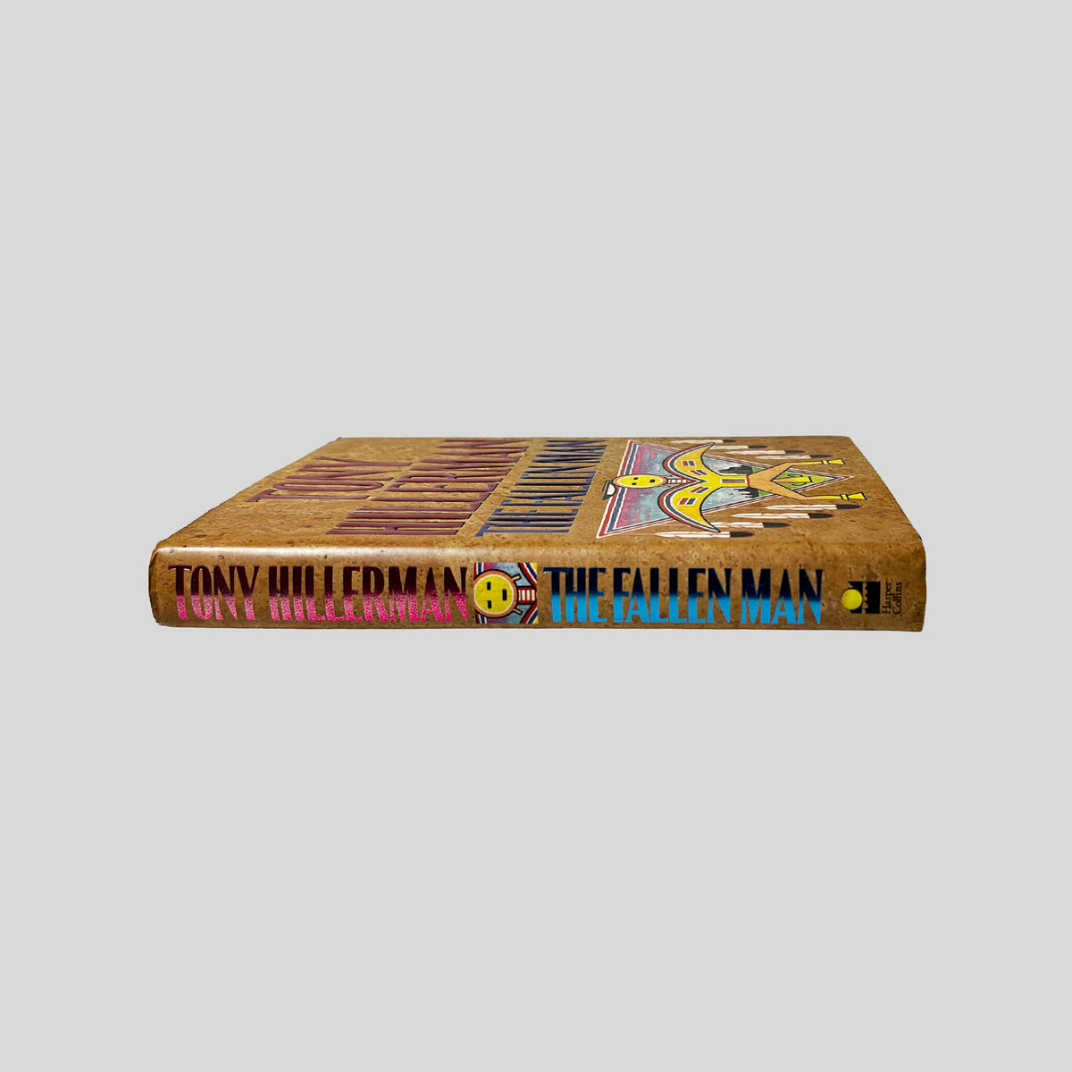 Spine view of The Fallen Man vintage hardcover edition by Tony Hillerman.